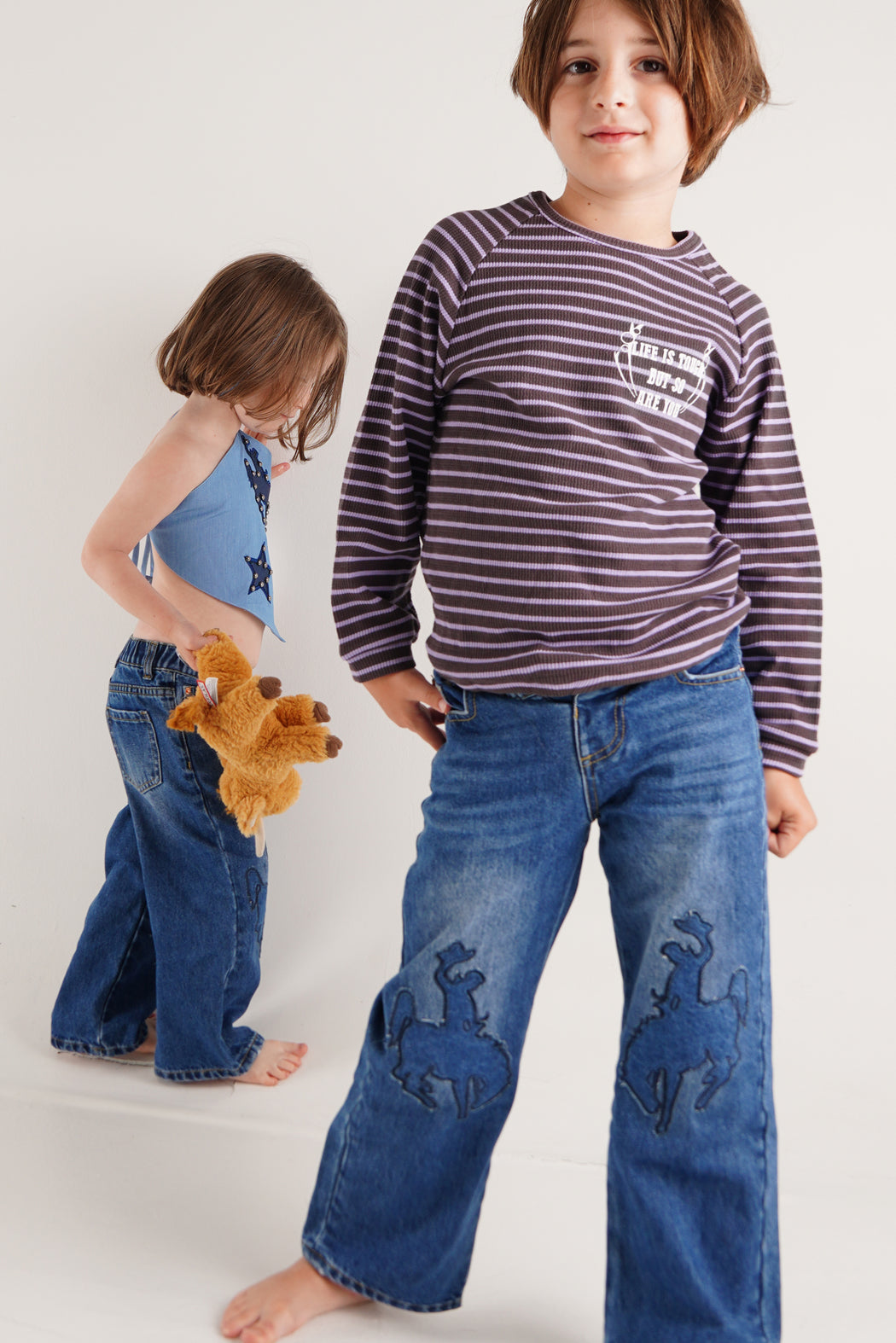 COWBOY PATCHED JEANS