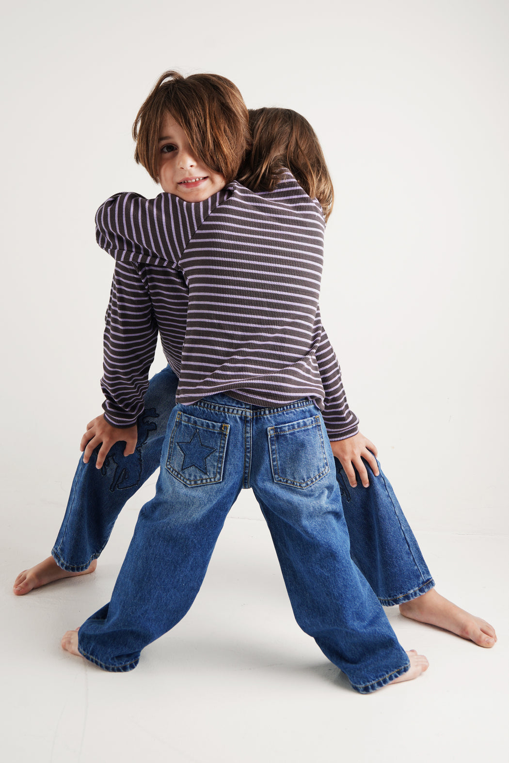 COWBOY PATCHED JEANS