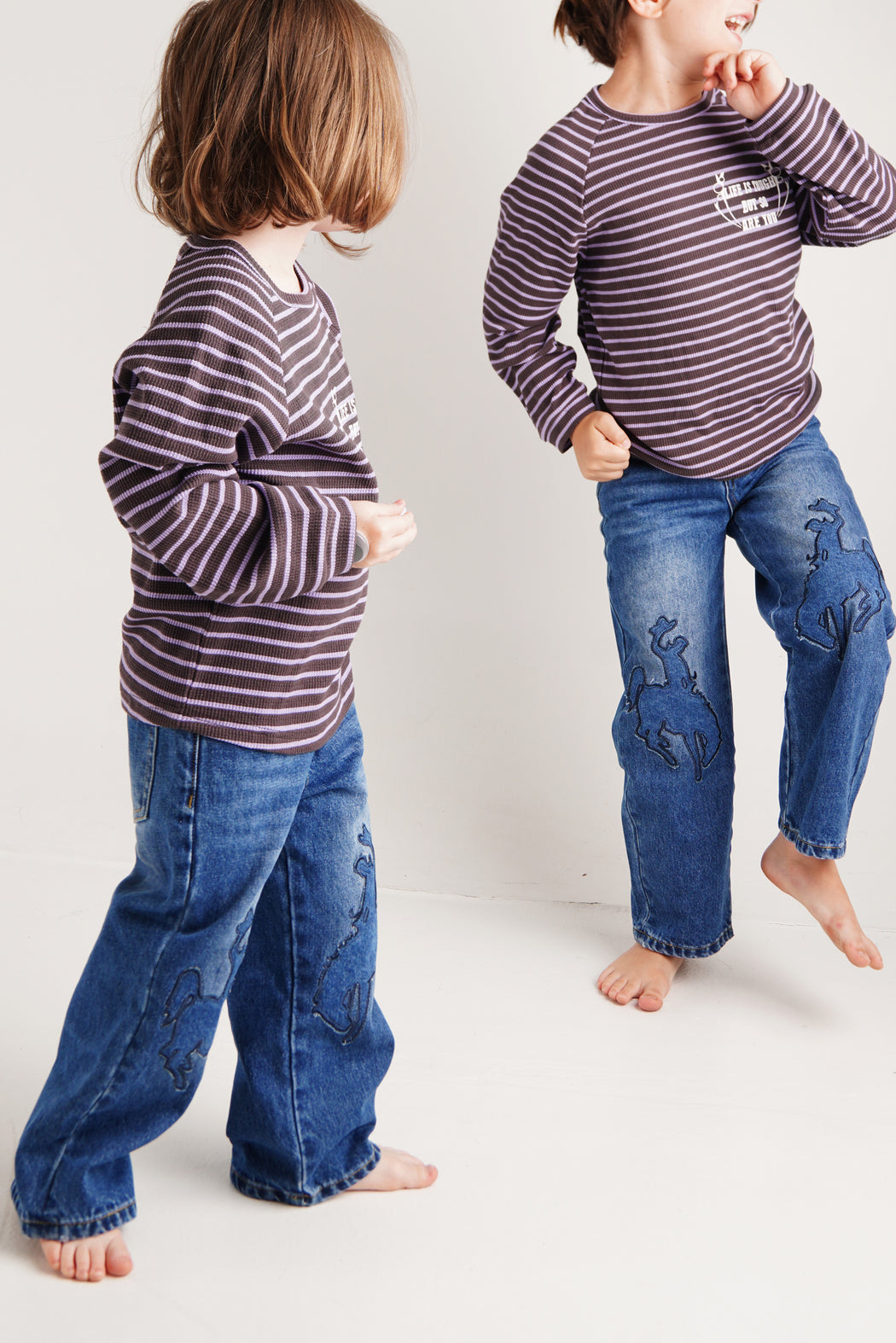 COWBOY PATCHED JEANS