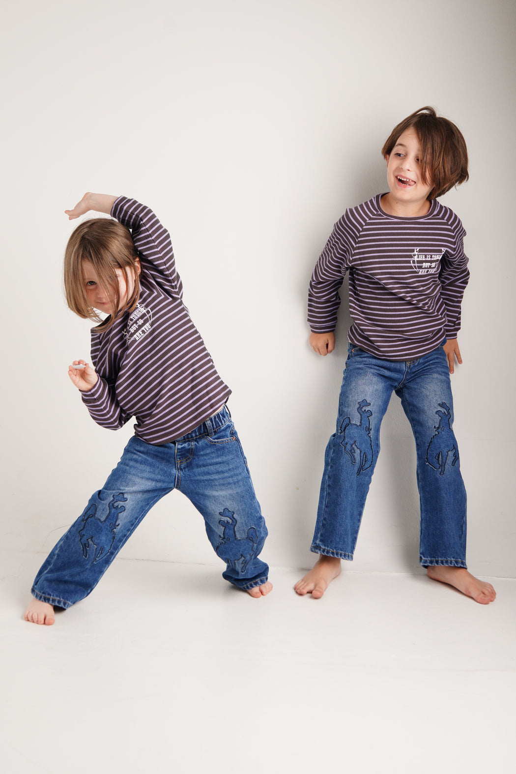 COWBOY PATCHED JEANS