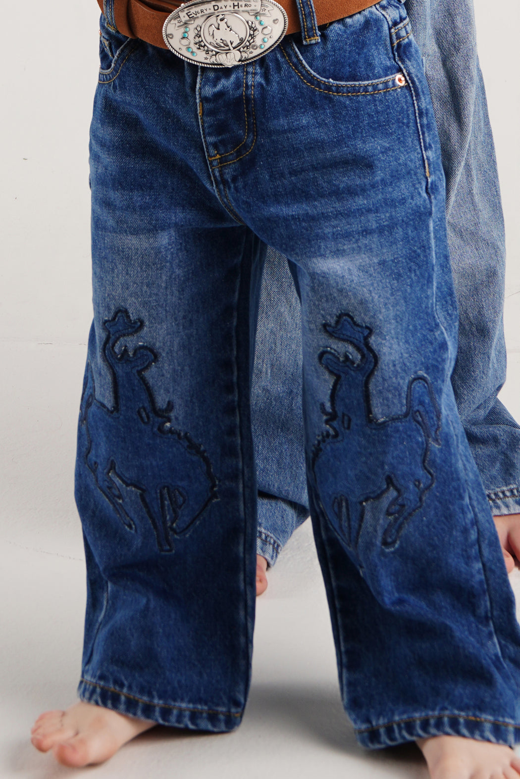 COWBOY PATCHED JEANS
