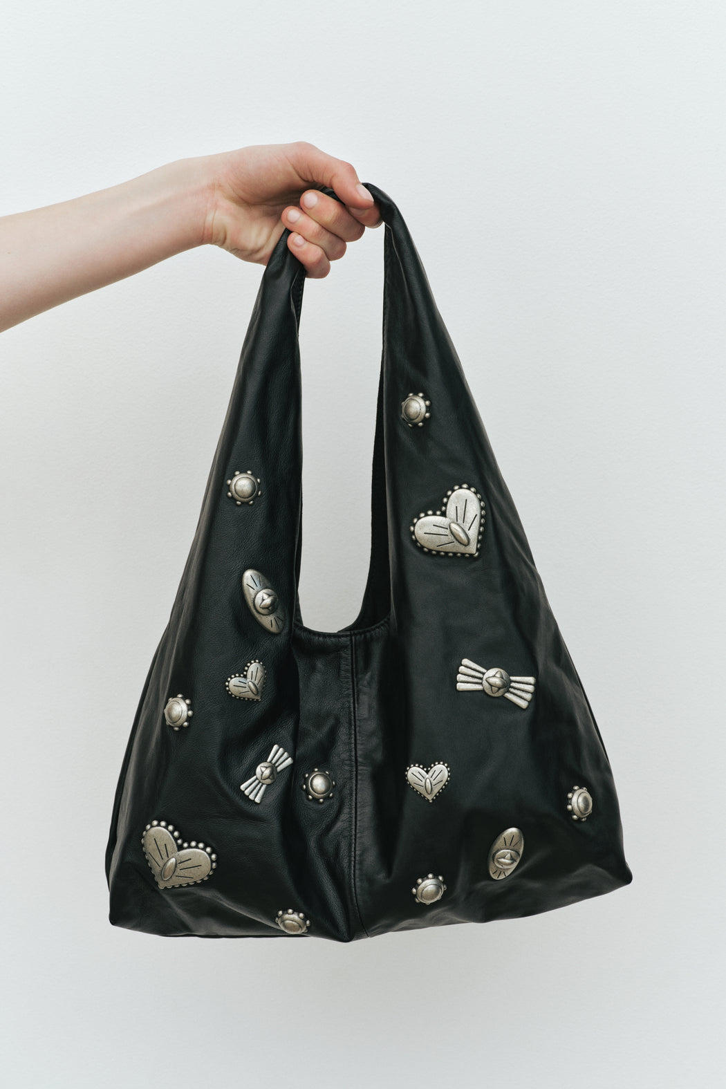 LEATHER CONCHO SLOUCH BAG