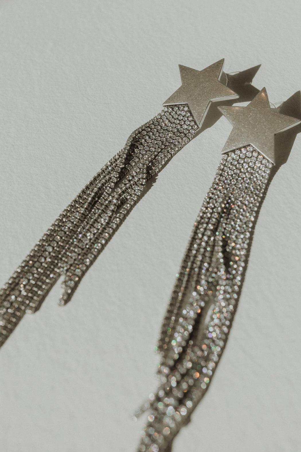 FRINGE STAR EARRINGS IN SILVER
