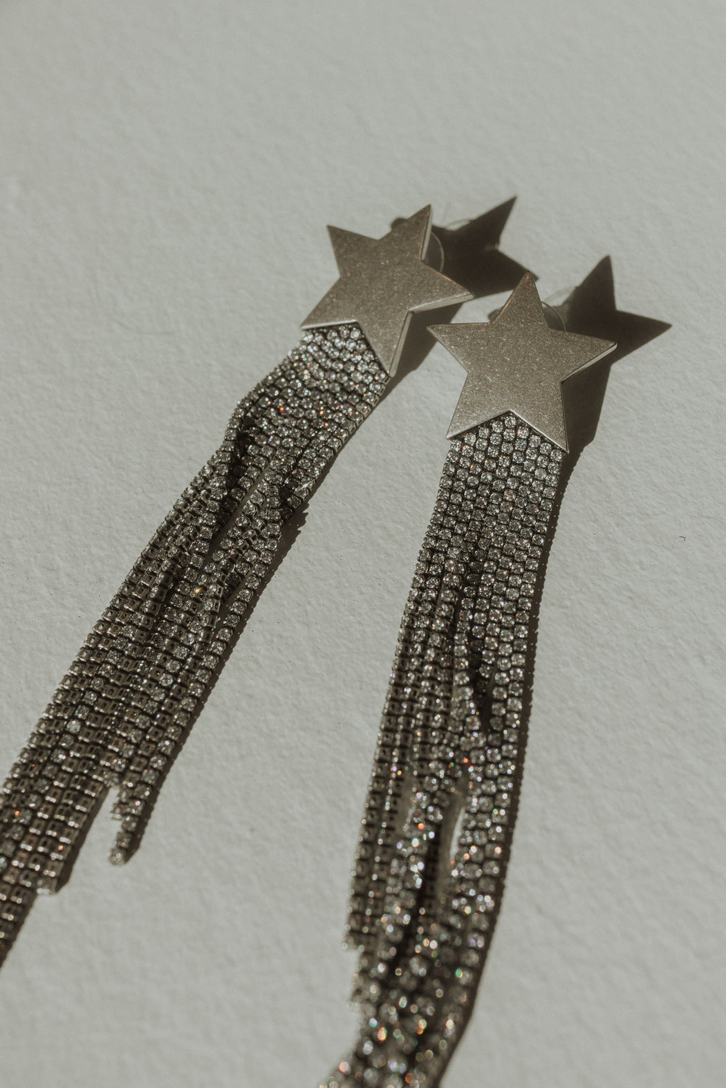 FRINGE STAR EARRINGS IN SILVER